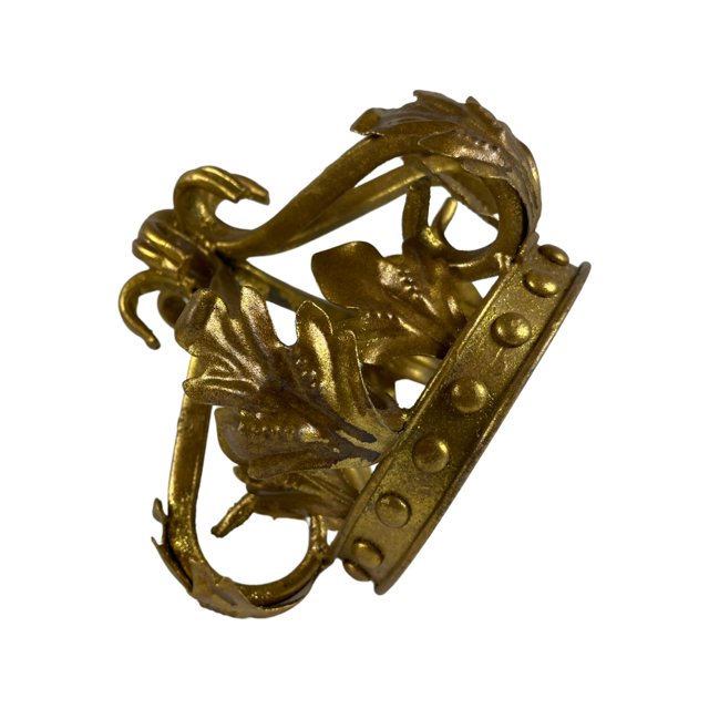 Side view image of a metal decorative gold crown.